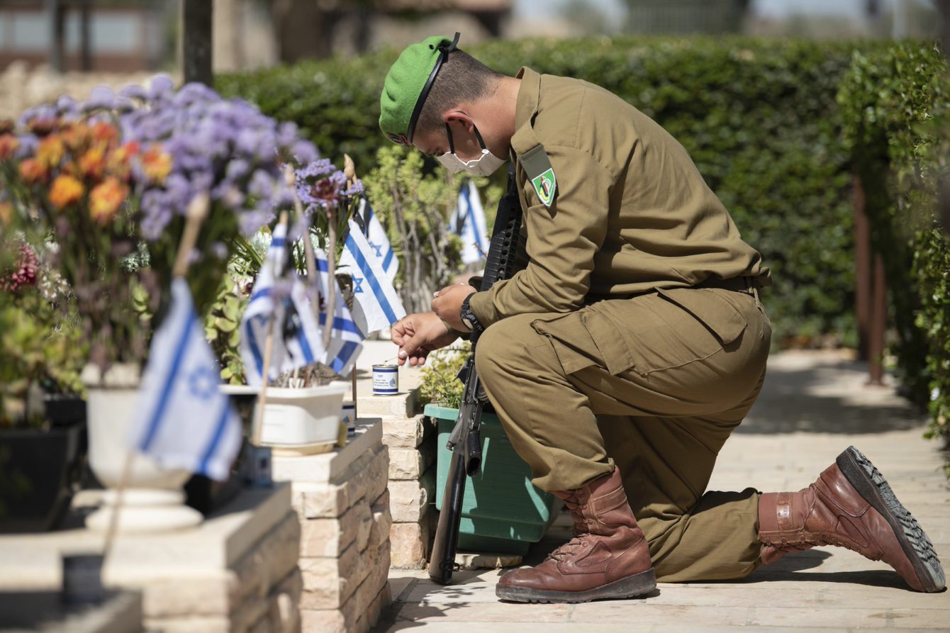 soldier taking a knee